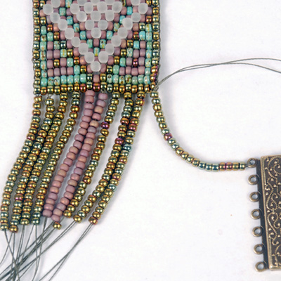 Attaching clasp to loom woven bracelet