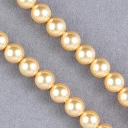 29-0615:  5810 6mm Gold Crystal Pearl 