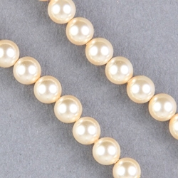 29-0639:  5810 6mm Light Gold Crystal Pearl 