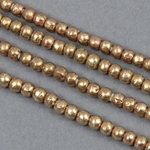 AFR-108:  4-5mm Brass Rounds Ethiopia 30-inch strand (approx 180 pcs) 